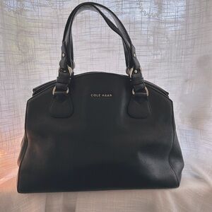 small vintage Cole Haan bag. Two compartments and one inner zippered pocket